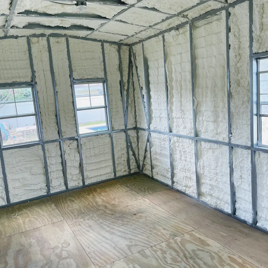 Closed-cell spray foam insulation applied to wall cavities in a residential project in Winthrop Town